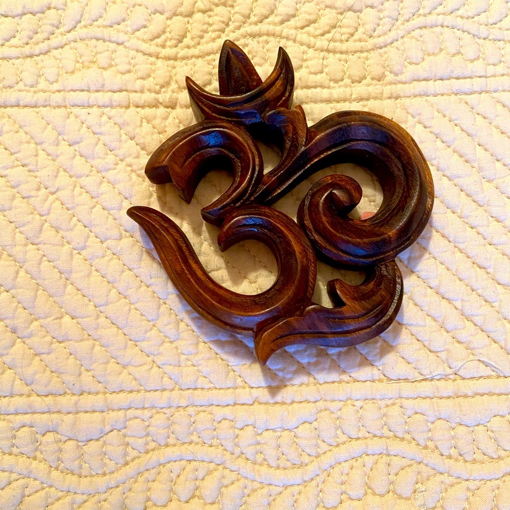 Small carved wood OM